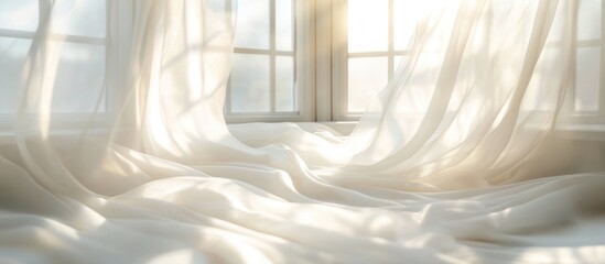 White Sheer Curtains Flowing in the Sunlight Through a Window.