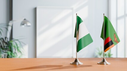 FLAGS OF NIGERIA AND ZAMBIA ON TABLE