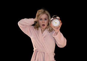 Shocked Girl Holding Alarm Clock in Pink Bathrobe