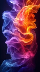 Obraz premium Colorful swirling smoke forms abstract shapes against a dark background in a mesmerizing display