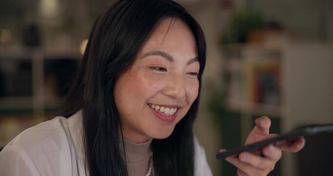Asian woman, work and phone with voice memo at night with planning, audio message and speaker with tech. Call, conversation and media consultant on project deadline with mobile networking in office