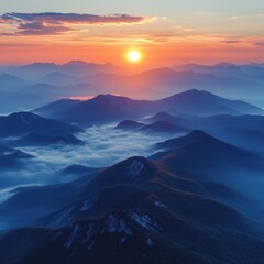 A breathtaking sunrise over misty mountains, showcasing nature's beauty and tranquility.