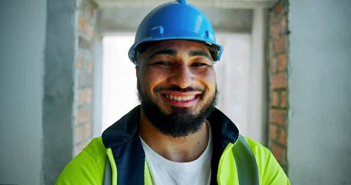 Contractor, face and man with arms crossed for construction site progress or project management. Happy, engineering or confident builder with helmet for building safety, labor or structure inspection
