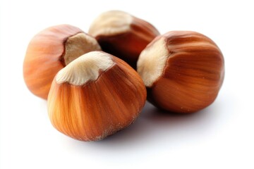 A selection of various nuts arranged on a clean white background