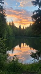 Obraz premium A tranquil forest lake mirrors the vibrant hues of a breathtaking sunset