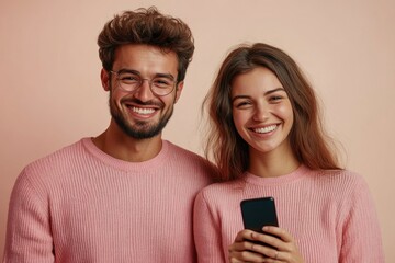 Fototapeta premium Man and woman showing joy while viewing phone, potential use in social media or family scene