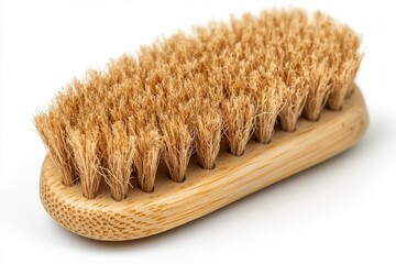 A close-up of a natural bamboo brush with soft bristles, ideal for skincare and exfoliation.