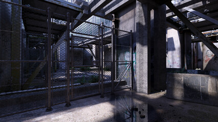 Betonwände mit Drahgitterzaun in einer verfallenen Fabrikanlage