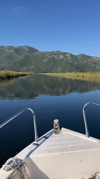 Scenic Boat Ride Through the Serene Swamps and Tranquil Waters of Lake Kuti in the Picturesque Neretva Valley, Croatia