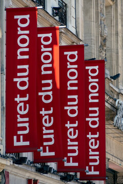 LILLE, FRANCE - JUNE 08, 2014:  Colourful banner signs outside Furet du Nord Bookstore On the Grand Place