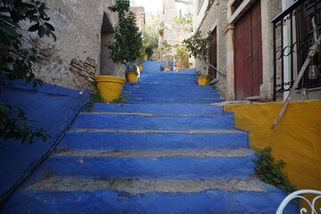 Fototapeta premium picturesque streets and colorful facades of Symi island
