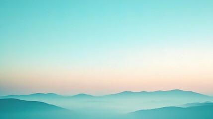 Soft Blue Gradient Sky Over Calm Mountains at Dusk