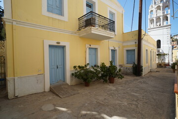 Fototapeta premium picturesque streets and colorful facades of Symi island