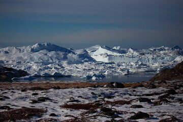 Obraz premium Ilulissat, a city under the Arctic iceberg