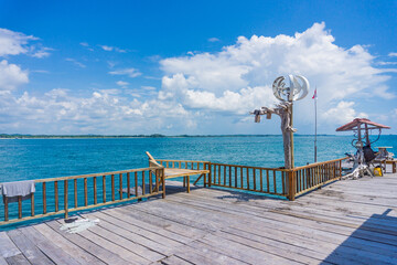 a floating house in the middle of the sea that provides various water sports rides such as snorkeling, diving, and canoeing, and there is also a BBQ for guests who want to
