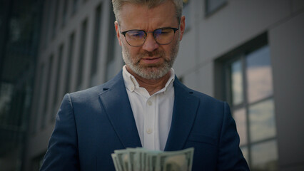 Successful rich wealthy retired employer middle-aged entrepreneur investor old male businessman...