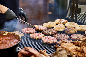 Cutlets and meat on barbecue