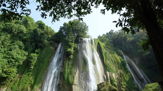 A beautiful waterfall in a tropical forest is indeed beautiful at Cikaso Waterfall, Sukabumi, Indonesia.