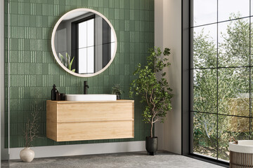 Minimalist bathroom with green ceramic wall tiles, a wooden vanity, and ample natural light, creating a simple yet sophisticated design.