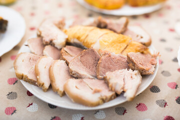 Cold cuts of different types of cooked meat on plate