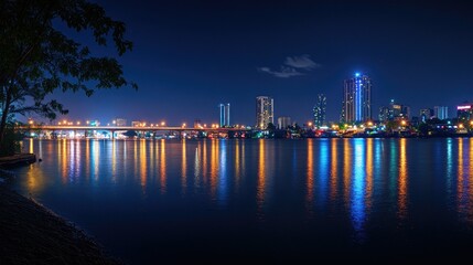 Vibrant City Lights Over Calm Water at Night