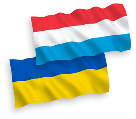 Flags of Luxembourg and Ukraine on a white background