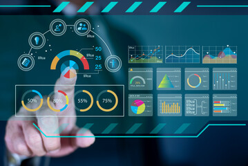 Businessman analyst manages the system database, and analysis data plans, and reports GDP marketing KPI sale. shows a dashboard chart. analytics business concept
