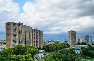 tall apartment buildings with balconies overlooking manhattan new york (west weehawken jersey city...