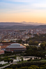 Sunset over the city of Logroño (Rioja, Spain) with the mountains on the horizon. Vertical photo