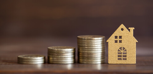 Gold money coins and house shape, mortgage loan banner
