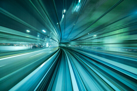 Motion blur of train moving inside tunnel in Tokyo, Japan
