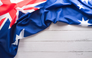 Happy Australia day concept. Australian flag against white wooden background. 26 January.