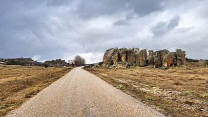The asphalt road beteen Ihsaniye and Uclerkayasi in the evening of a rainy autumn day