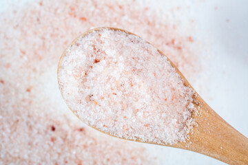 Pink himalayan salt on white background