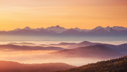 Fototapeta premium Golden Dawn Illuminates Misty Mountain Peaks background 9