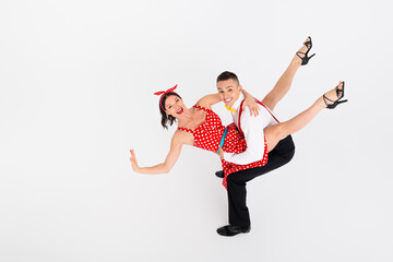 Photo of attractive couple professional dancers choreographers dancehall studio dance scool isolated on white color background