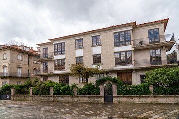 Beautiful streets of Pontevedra in a rainy day. Empy streets, no people. Famous travel destination in Galicia, Spain. Beautiful galician architecture, tipically for nortwh-west of Spain. 