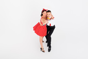 Photo of attractive charming couple professional dancers dance tango rumba salsa rhythm isolated on...