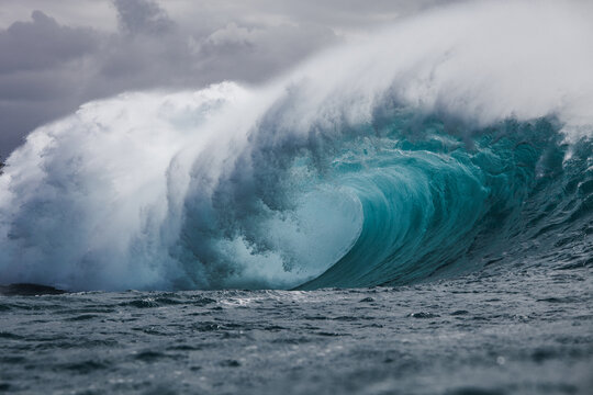 Close-up of a large Tube wave crashing over a reef, Hawaii, USA