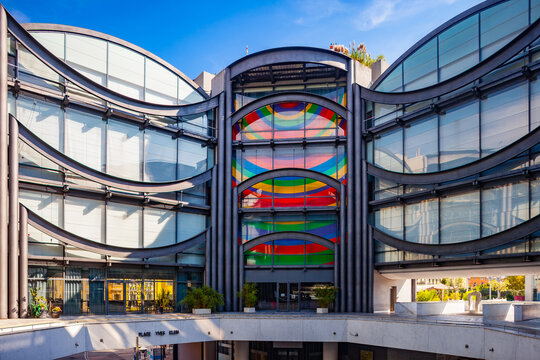 NICE, FRANCE - AUGUST 29, 2019: inner courtyard and glass facades of "Musee d'art moderne et d'art contemporain", called MAMAC, Museum of Modern and Contemporary Art, wall painting by Sol LeWitt