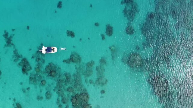 Jumping off the boat in tropical island paradise Fiji