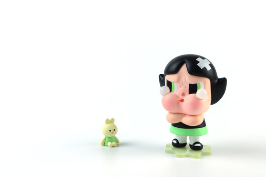 art toys crybaby x powerpuff girls collection from Pop Mart blind box collectable cute toys display on white shelf at Pop mart store in department store during new release Popmart promotion event	