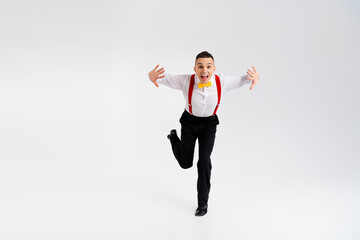 Full size photo of classy young man dance wear vintage outfit empty space isolated on white color...