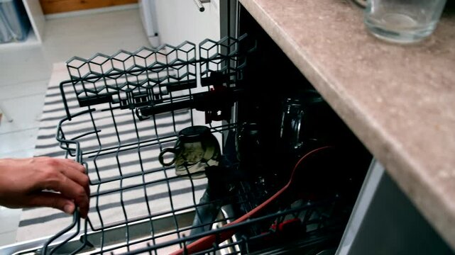 Video shows efficient dishwasher loading, optimizing space and ease