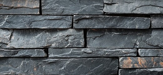 Textured dark stone wall pattern