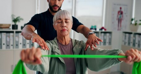 Clinic, old woman and physiotherapist with exercise band for stretching, wellness and healing for injury. Rehabilitation, patient and expert with help for physiotherapy, recovery and fitness advice