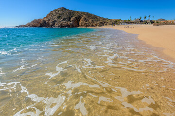 Santa Maria Beach, Cabo San Lucas, Mexico. Different stages of the fantastic ocean waves. Rocky and sandy beach. © karamysh