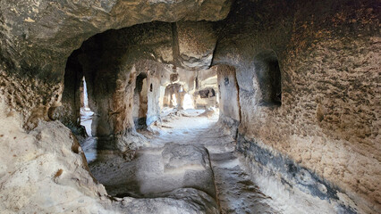 Obraz premium Interior view of chambers and chapels inside the Kirkinler Byzantine Rock Monastery in Iscehisar district of Afyonkarahisar province in the western Anatolia in Turkey.