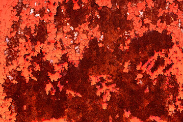Texture of old rusty metal with scratches and mother-in-law. Abstract grunge metal texture with traces of multi-colored paint