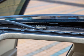 Close-up of the car sunroof opening mechanism